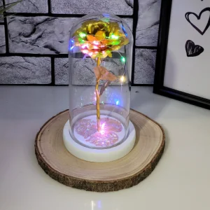 Златна роза в стъкленица