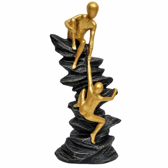 Арт фигура подадена ръка с два златисти силуета върху черна скала