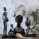 Декоративна статуетка африканка - седяща на супер цена от Neostyle.bg
