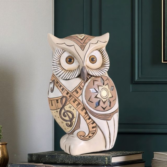 Декоративна фигура на мъдър бухал с ноти и пиано клавиши