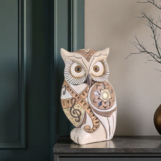 Декоративна фигура на мъдър бухал с ноти и пиано клавиши