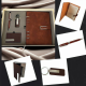 Стилен подаръчен комплект за мъж с кафяв кожен тефтер, химикал, визитник и ключодържател в кутия